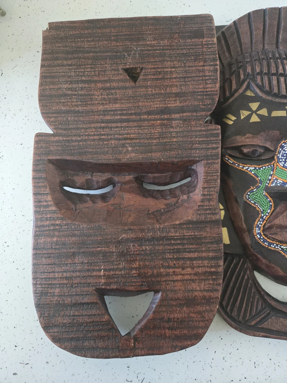 Hand-Carved Brown African Mask Wall Decor with Green Bead Accents